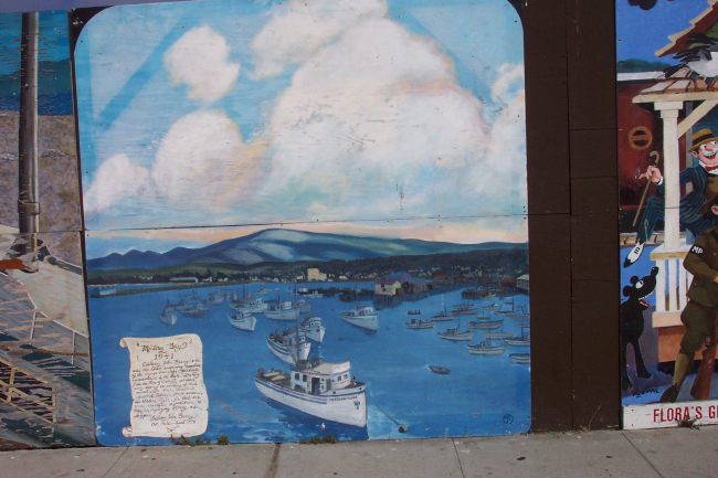 Waterfront art at a construction site commemorating the Cannery Row of the1930's and 1940's