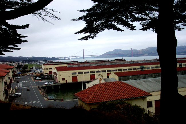 The Golden Gate Bridge as seen over the wharves at Fort Mason
