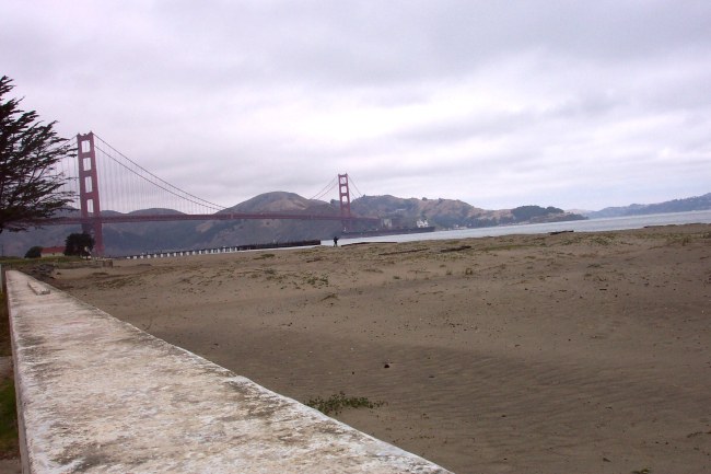 A ship passing under the Golden Gate Bridge