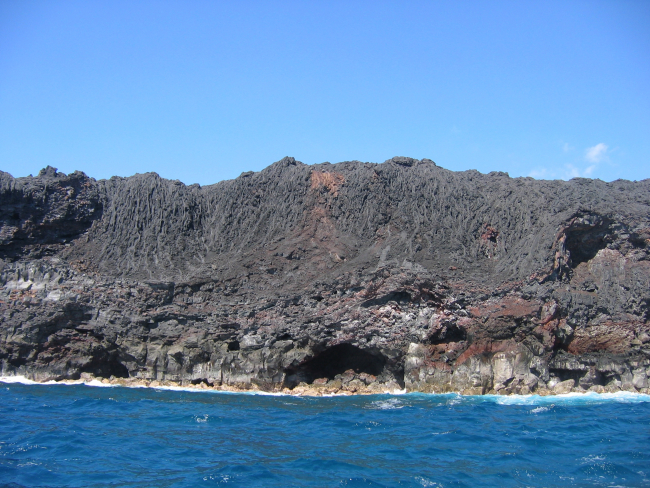 Recently cooled lava where it meets the sea near South Point of Hawaii