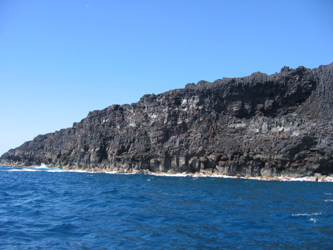 Recently cooled lava where it meets the sea near South Point of Hawaii