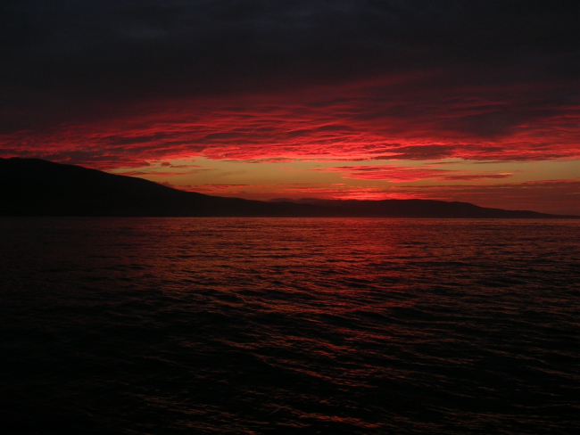 Sunrise at Point Conception as viewed from the contract fishery research vesselAGRESSOR