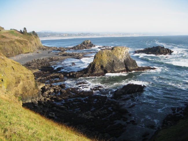 Wind, surf, and a rocky shore