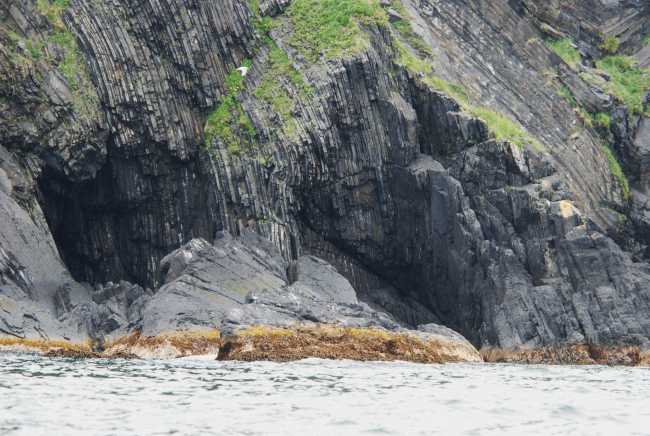 Vertical beds and sea caves eroding