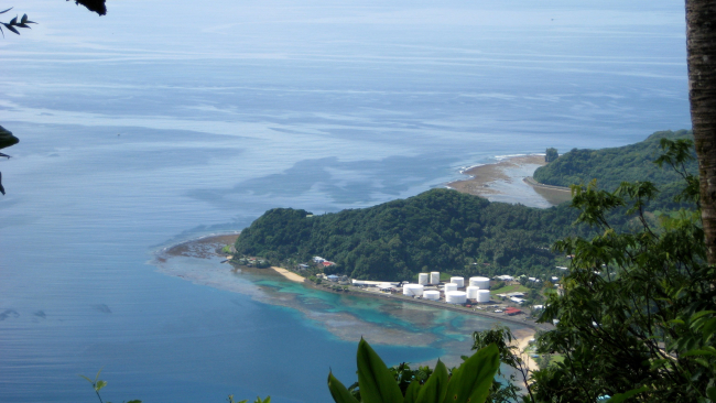 The fuel tanks at the entrance to Pago Pago Harbor
