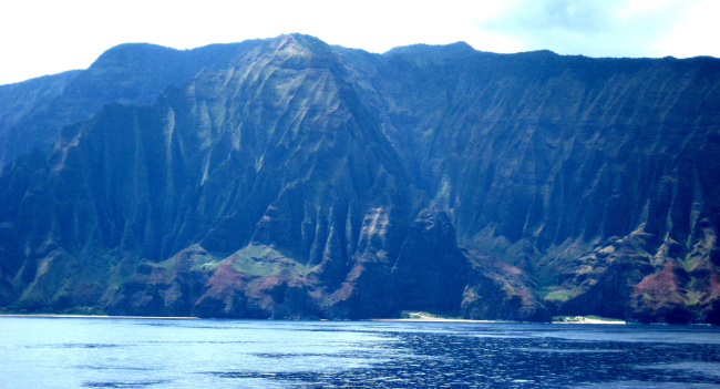 A view from offshore of the Na Pali coast, along the northwest shore of Kauai