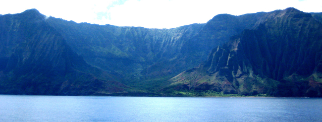 A view from offshore of the Na Pali coast, along the northwest shore of Kauai