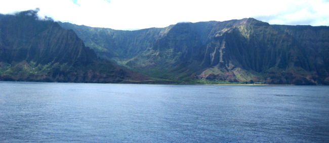 A view from offshore of the Na Pali coast, along the northwest shore of Kauai