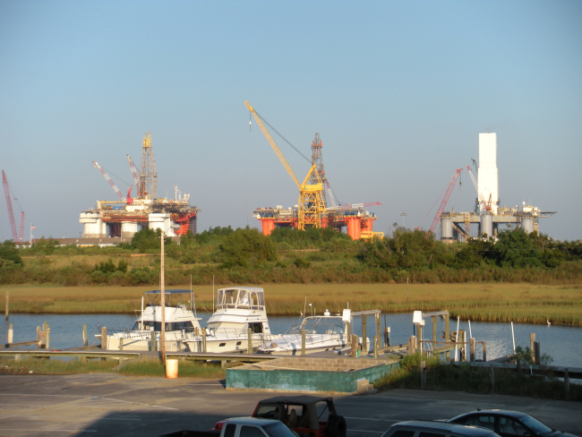 Dormant oil rigs looming over the horizon