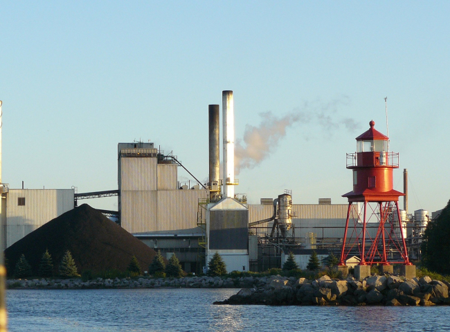 Navigation light at industrial facility harbor area