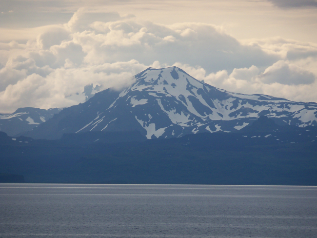 Volcanic cone with Aghileen Pinnacles in the background