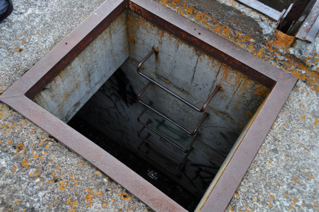 Ladder down to bomb shelter at Dutch Harbor Army lookout bunker dating to WorldWar II