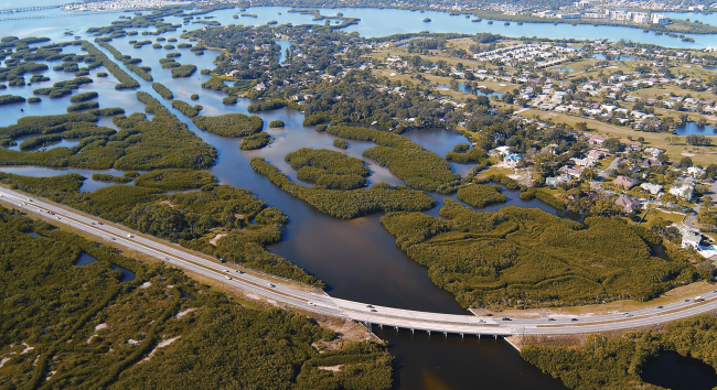 Buildup over wetlands and modification of wetland drainage patterns