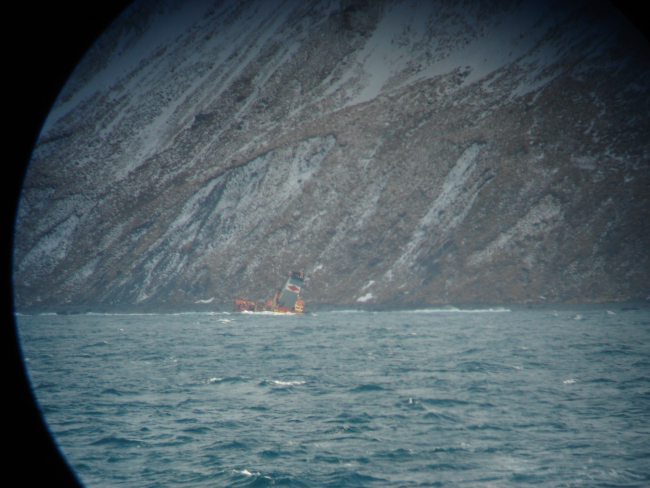 The stack of the SELENDANG AYU seen and photographed through thealidade of the NOAA Ship MILLER FREEMAN