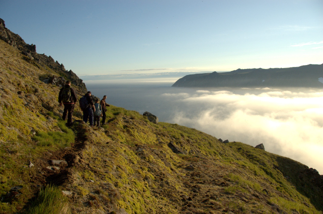Heading down the trail from the summit of Little Diomede Island